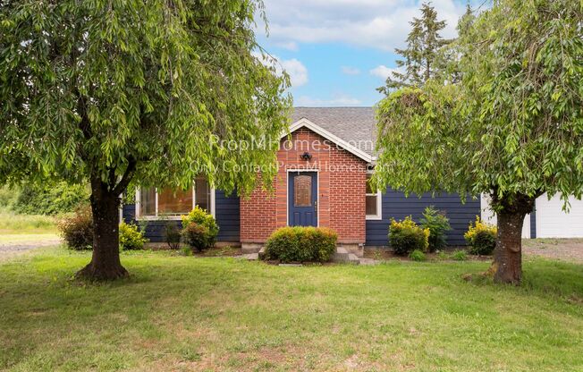 Five Bedrooms, Two and Half Bathrooms on Three Acres in Happy Valley! Charm at its Finest!