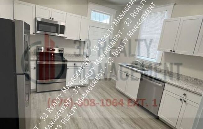 1201 E 32 ST