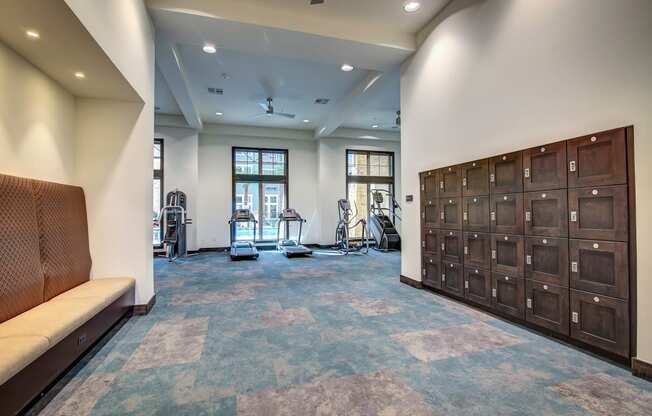 the reserve at bucklin hill fitness room with weights and stationary bikes