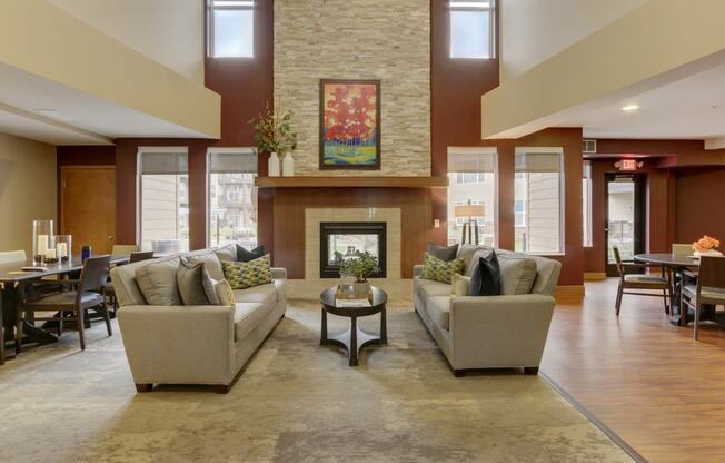 Community Room with sitting area at The Legends at Silver Lake Village 55+ Apartments, St. Anthony, Minnesota