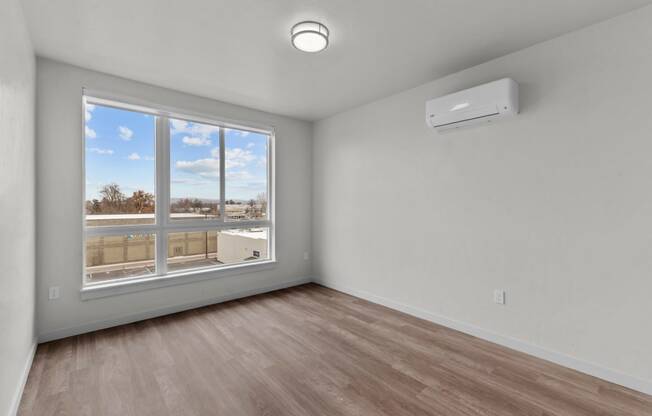 Old Town Lofts Bedroom with Large Window