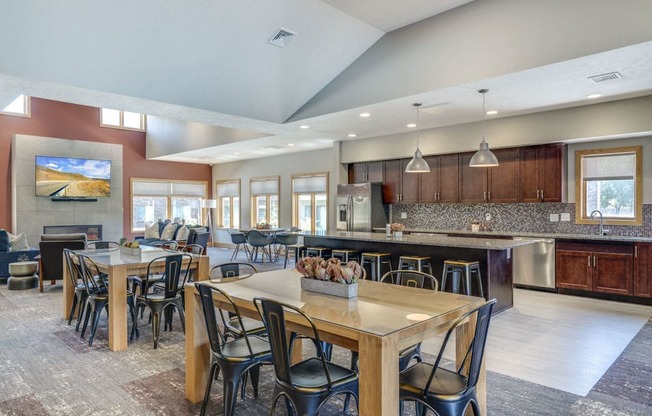 Clubhouse with seating and kitchen for resident's use at Fountain Glen Apartments