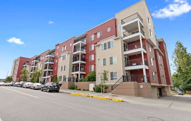 a large view of the property building with balconies at Arabella Apartment Homes, Washington, 98155