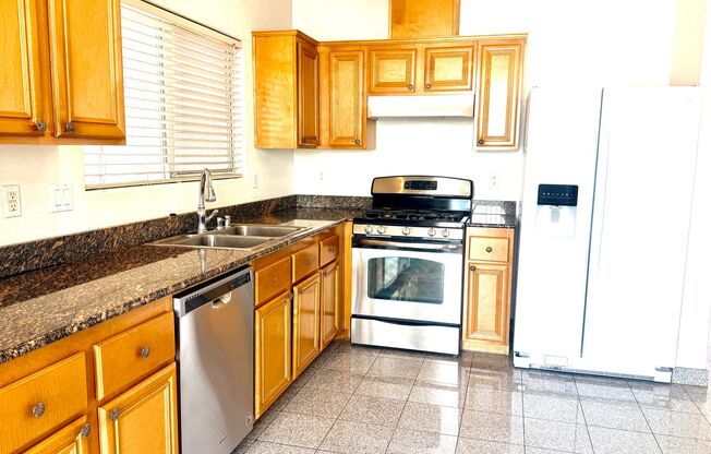 Rhodes Ranch Community: including a clubhouse, playground, and an in-ground community swimming pool complete with a waterfall.