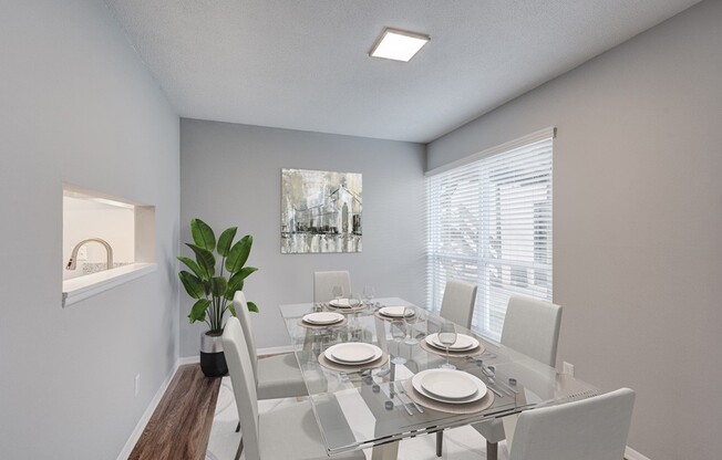 Explore the elegant dining space at Crossings @ 501 Apartments, designed for both style and comfort. Its modern aesthetic pairs perfectly with ample natural light, making every meal feel special. Schedule your visit today!