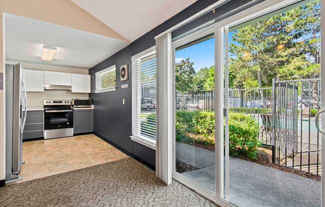 Hunt Club clubhouse kitchen and sliding glass door to patio