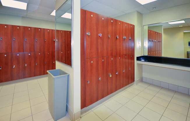 a view of stalls in a locker room in a public restroom