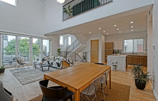 Custom, Modern & Spacious Tri-Level Home w/ Amazing Great Room Living Space, 4 Balconies/Decks, Ocean Views & 2-Car Garage Close to Schools, Restaurants, Shopping & Just 4 Blocks to Beach!