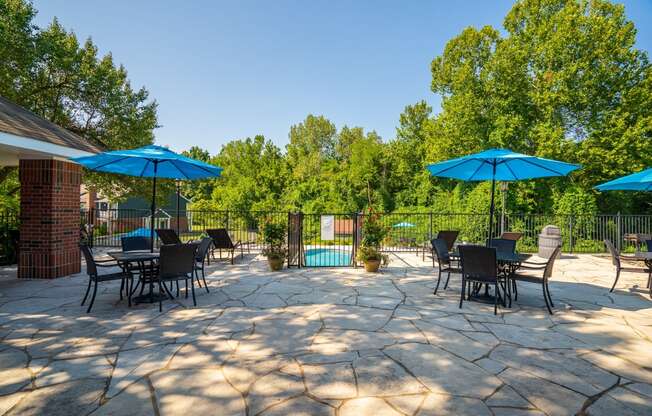 Sundeck Lounge Area With Tables & Umbrellas