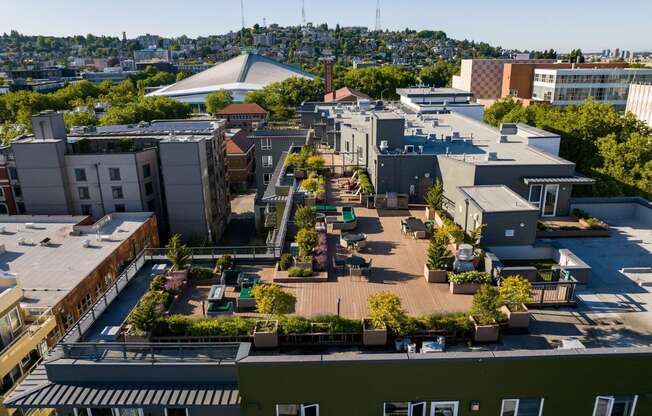 an aerial view of a large city with trees and rooftops at Axis, Washington, 98109