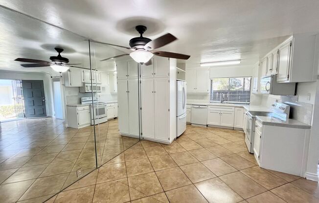 Spacious 3 Bedroom 2 Bathroom Town-Home with In-Unit Laundry, Pool and 2 Parking Spaces!