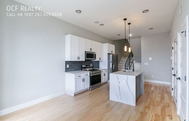411 W HEWSON ST