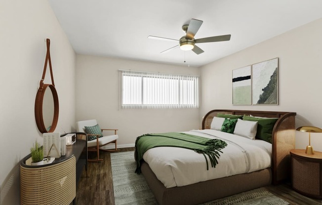 a bedroom with a bed and a ceiling fan