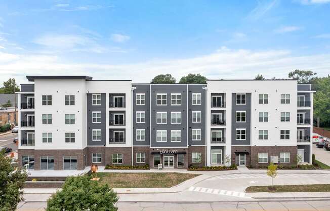 A modern apartment building with the name "Dover" on the front.