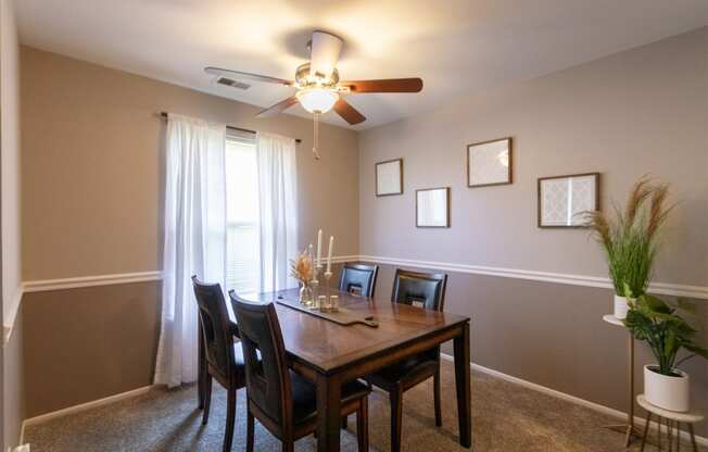 This is a picture of the dining room in the 980 square foot, 2 bedroom, 1 bath model apartment at Fairfield Pointe Apartments in Fairfield, Ohio.
