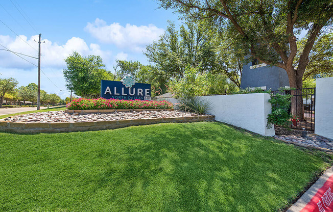 Community Monument Sign at Allure North Dallas Apartments in Dallas, TX.
