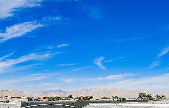 Unique condo with rooftop Strip Views and modern amenities.