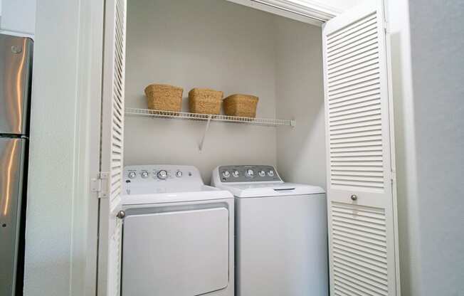 the laundry room has a washer and dryer
