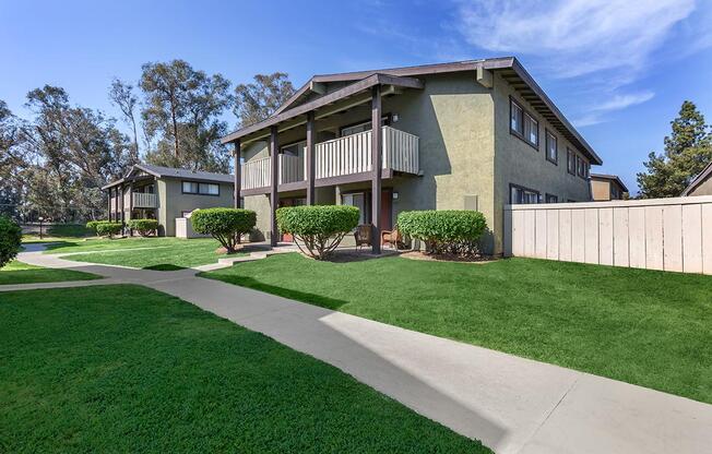 a large lawn in front of a house