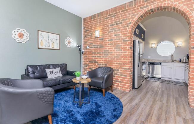 a living room filled with furniture and a fireplace