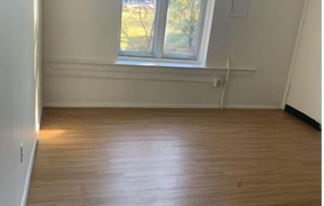 2030 Saint Paul Street (aka 37 E 21st)