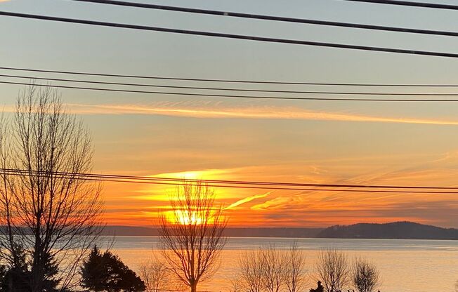 Top Floor West Facing 1bd/1ba Condo with Sound Water Views!