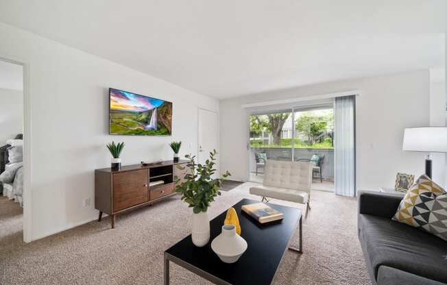 a living room with a couch and a coffee table