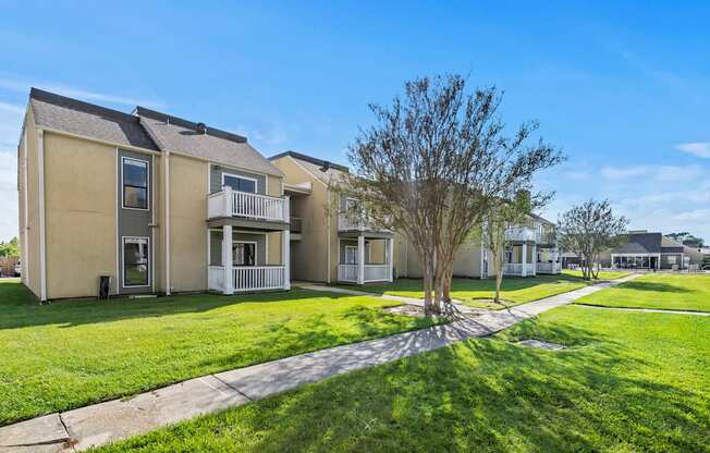 the preserve at ballantyne commons exterior of apartments with grass