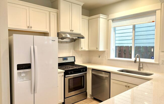 Spacious Mill Park 2-Level Single Family Home with Fenced Backyard
