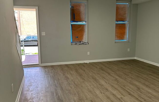 Brand New Renovation! Open Floor Plan! W/D! Central Air! Front Porch! Rear Deck! Close to Public Transportation!