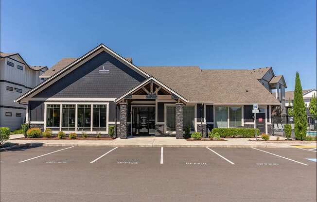 A building with a parking lot in front of it at Timberridge Place Apartment Homes, Albany, 97322