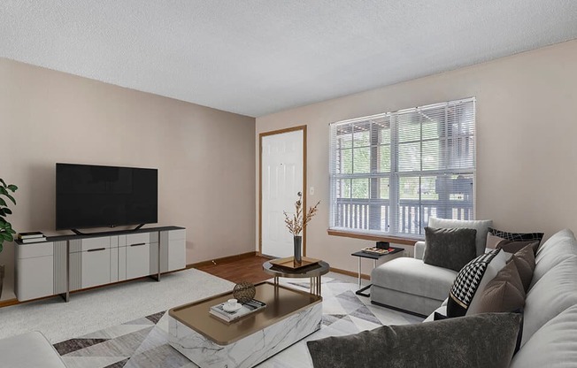 a living room with a couch and a coffee table