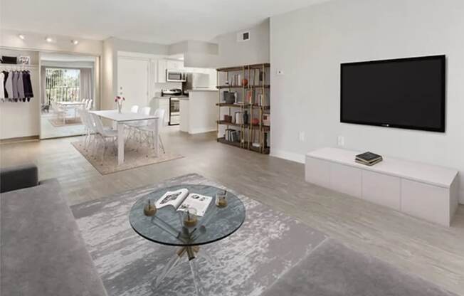 a living room with a table and a television