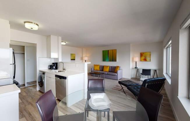 a kitchen and living room in a 555 waverly unit