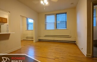 1050 W George St