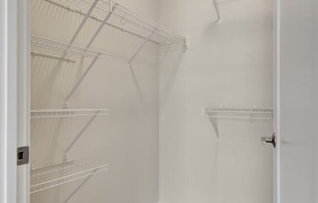 a walk in closet in a 555 waverly unit