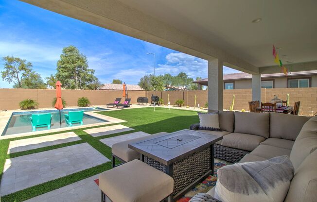 Gorgeous 5 Bedroom + 3 Bathroom + 2 Car Garage + Private Pool + Putting Green in Goodyear!