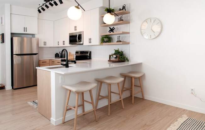 Fitted Kitchen With Island Dining at CityLine Apartments, Minneapolis, 55406