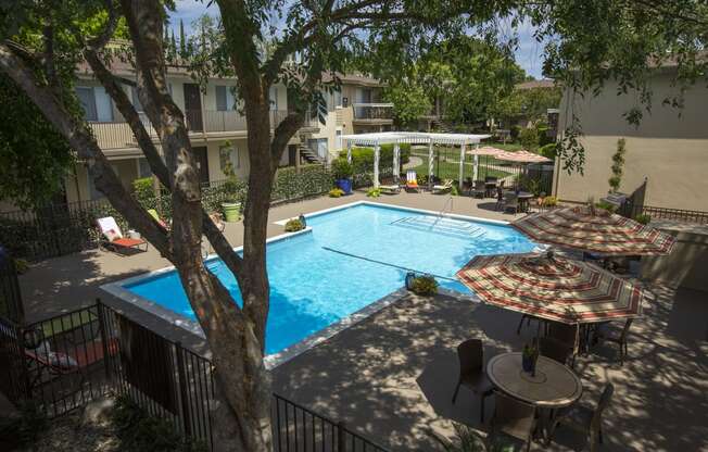 an aerial view of the pool and patio