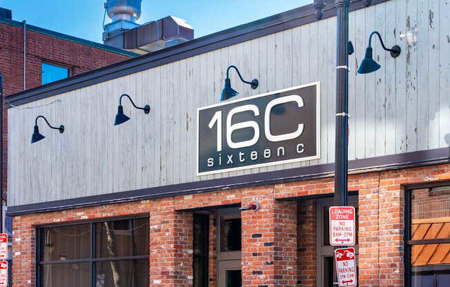 A building with a sign that says 16C.