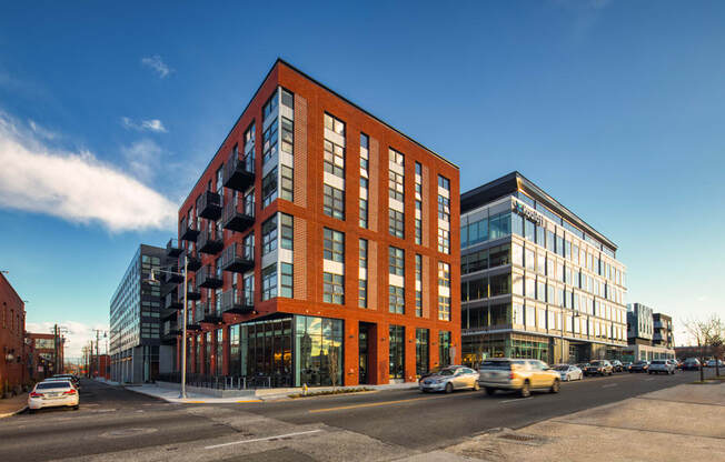 a rendering of a large building on a city street