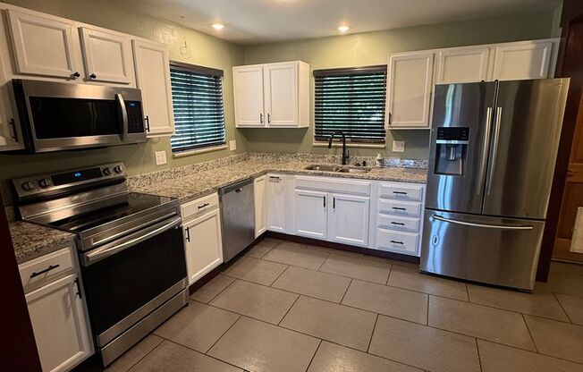 2 bedroom / 1 bath Mid-Century brick duplex in the Sunnyside