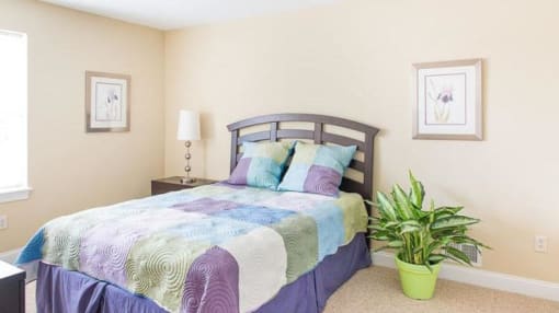 Spacious bedroom with large window