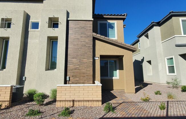 Beautifully designed modern townhome with attached garage.