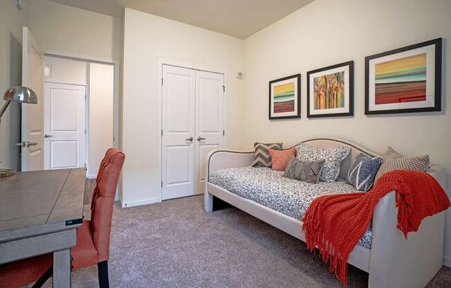 Dominium_Bren Road Station_Bedroom with wall farmes at Bren Road Station 55+ Apartments, Minnetonka, MN