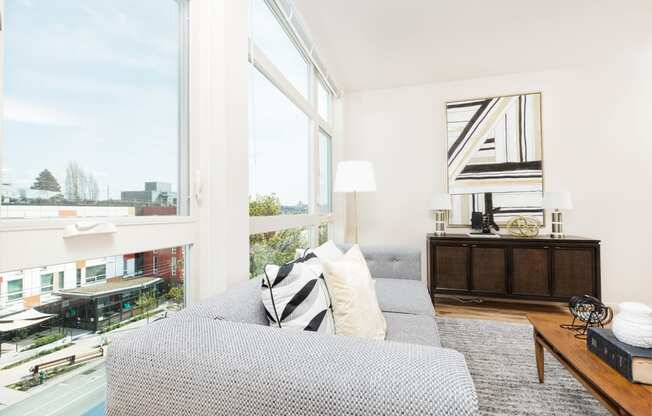 The Hayes on Stone Way Apartments living room with large windows at The Hayes on Stone Way, Seattle