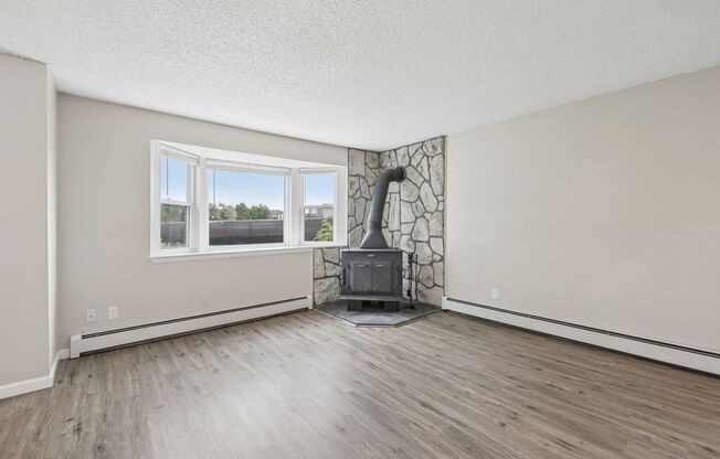 Townhome-Style Living with Greenbelt Views, Attached Garage & Community Pool!