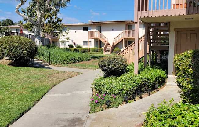 Gardens around apartment enterences at Plaza Verde Apartments in Escondido, California.