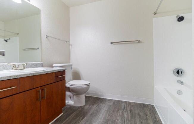 a bathroom with a toilet and a sink