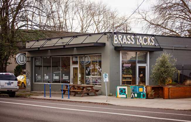 the exterior of a bass acids store on the side of a street
